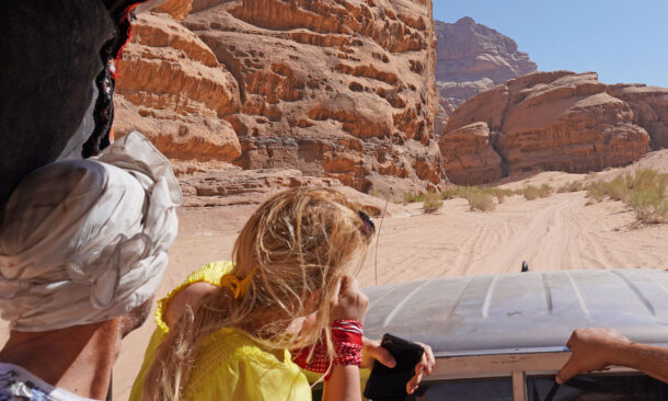 Jordan, The Wadi Rum Desert - tourist visiting the desert