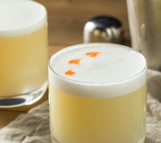 Sampling a Peruvian pisco sour