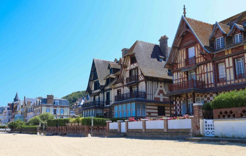 The traditional homes on Deauville beach in Normandy – France.
