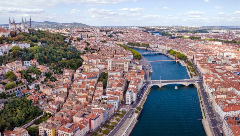 Lyon city aerial panoramic view, France, beautiful architecture of church Basilique Notre Dame de Fourviere, panorama cityscape with Saone river from above