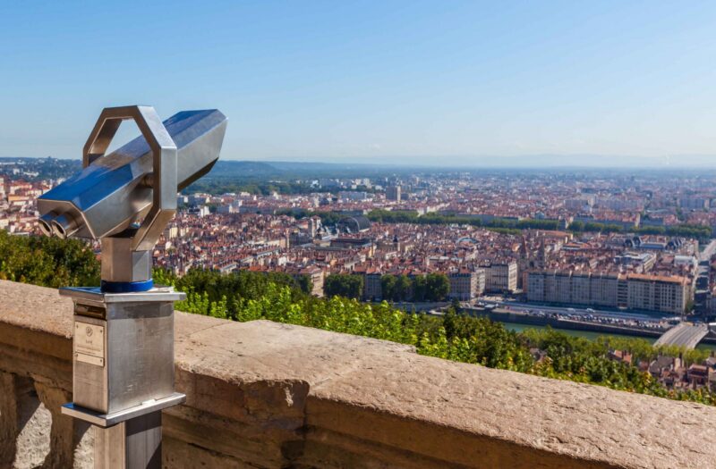 Telescope overlooking for Lyon, France, cityscape from above. Shot with a Selective focus