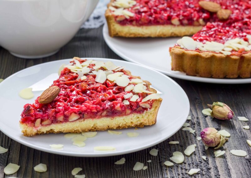Homemade pink praline tart, almond tart.
