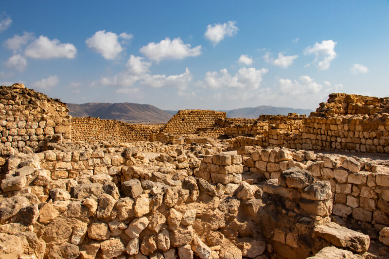 Ruins of Khor Rori and Sumhuram historical Unesco site in Taqa near Salalah in Oman Arabian peninsula, Asia, Blue sky, Building, Cloud, Dhofar, Khor Rori, Middle east, Oman, Rock, Salalah, Samahram, Sky, Stone, Sumhuram, Sun, Taqa, Travel, Unesco, Village, Wadi Darbat, autumn, beautiful, brown, bush, coast, coastline, fall, hiking, historical, holiday, indian ocean, outdoor, ruins, scenic, summer, tourism, vacation, view, yellow