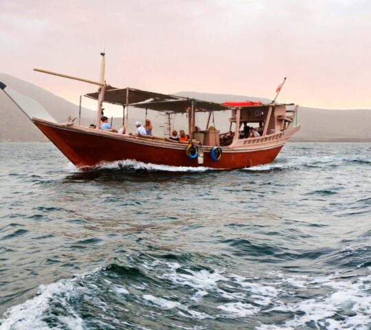 A traditional dhow sets sail from Muscat