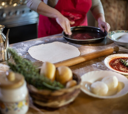 Preparing authentic Italian pizza
