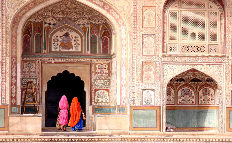 Two women walking in the Amber Fort, Jaipur