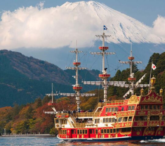A colourful cruise ship on Lake Ashi