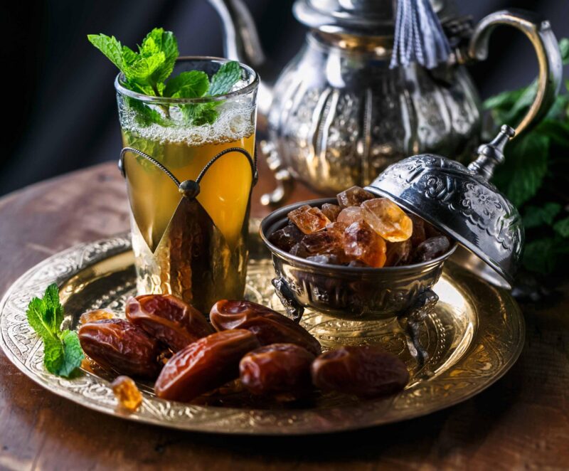 Close view of glass of moroccan mint tea.