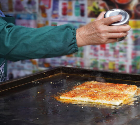 Sampling street food in Lijiang