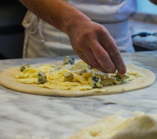 An essential pizza-making experience