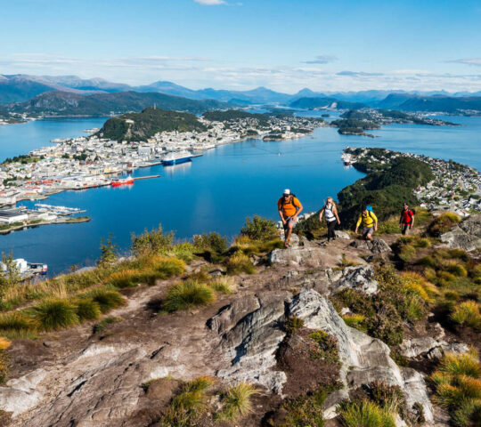 Hikers above the fjords