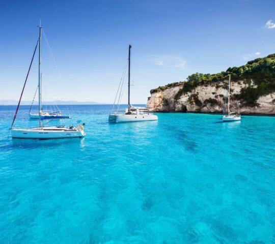 Sailing boats on azure waters of the Aegean Sea