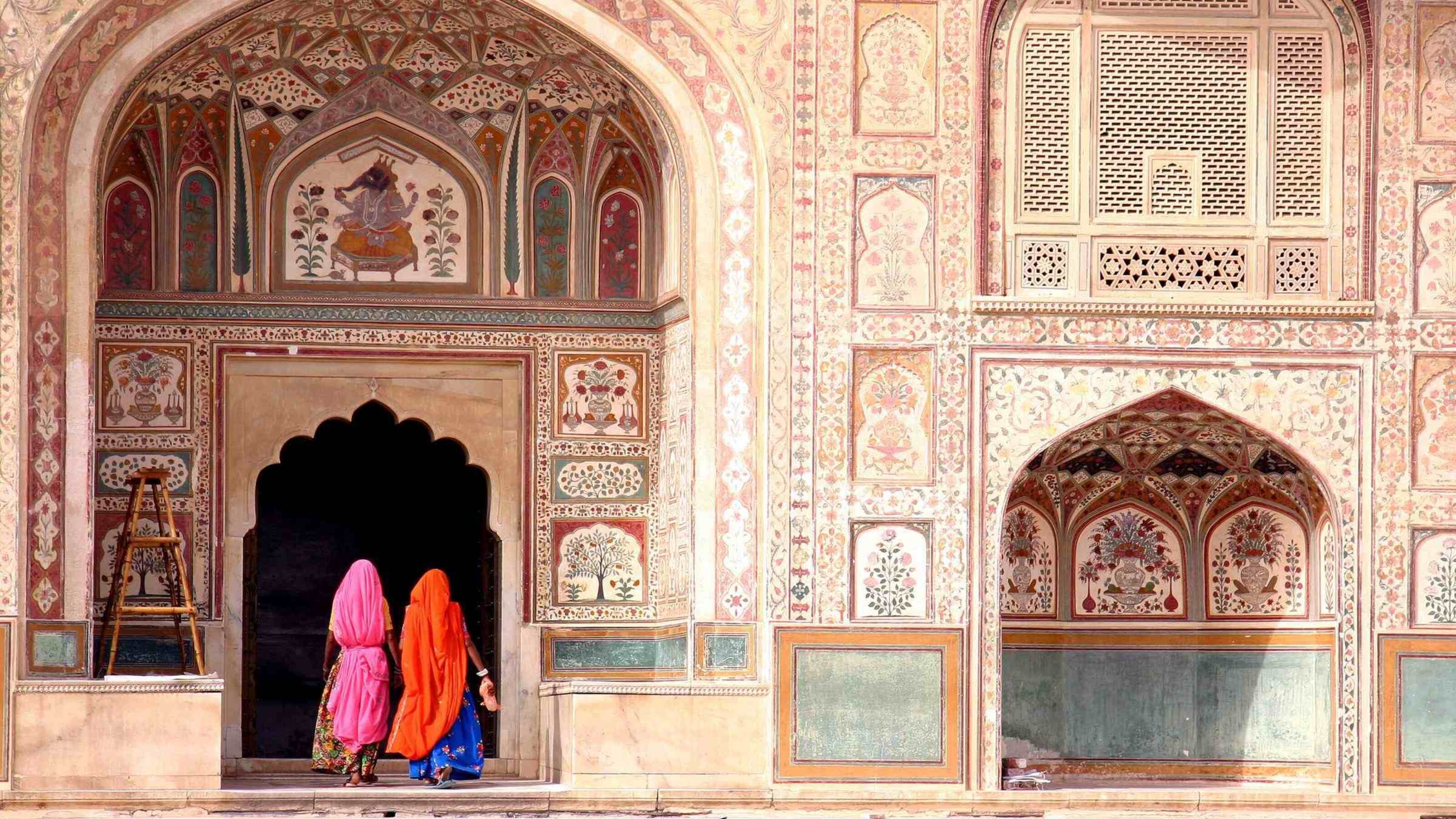 Two women walking in the Amber Fort, Jaipur
