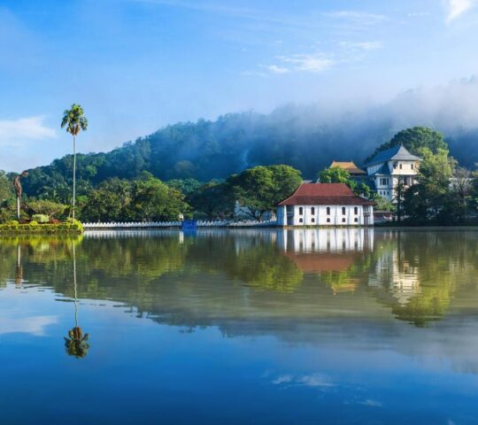 Serene waters reflect beautiful Kandy