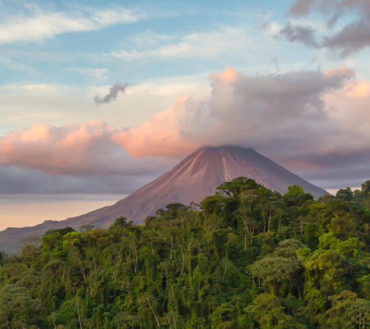 See Arenal Volcano at sunrise