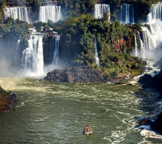 A boat trip close to the cascading Iguassu Falls