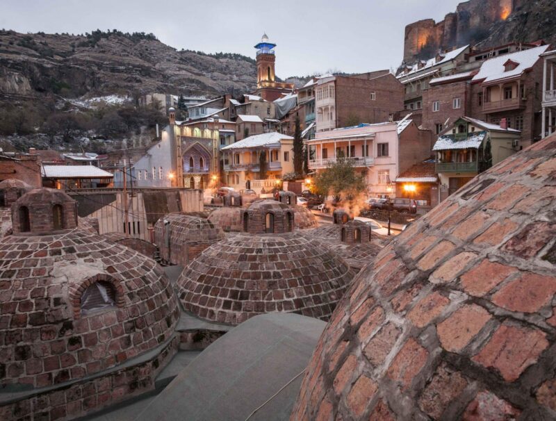 Evening view of public Sulphur baths in Abanotubani, old district of Tbilisi, Georgia.