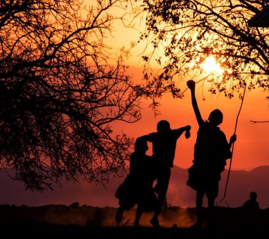 Maasi children having fun at sunset