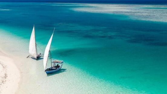 Dhow boats moored at a secluded sandbank at Pemba Island, Tanzania.