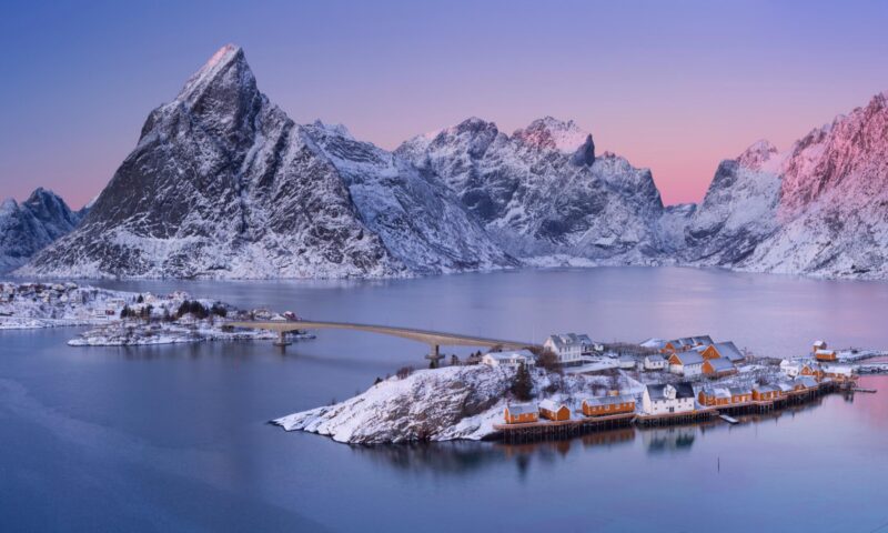The village of Reine on the Lofoten in northern Norway. Photographed at dusk in winter.