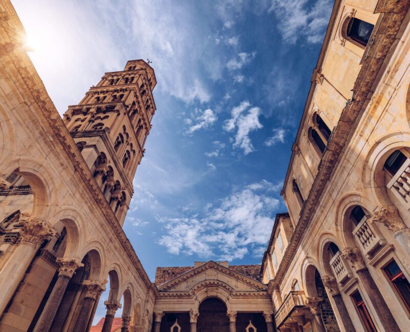Diocletian’s Palace’s peristyle in front of Cathedral of Saint Domnius’ bell tower in Split, Croatia. Diocletian palace UNESCO world heritage site in Split, Dalmatia, Croatia.