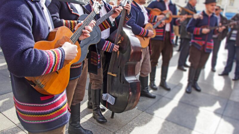 Traditional Croatian musicians in Slavonian costumes play in the city square slavonian, croatia, traditional, croatian, music, costume, people, festival, costumes, europe, street, folk, folklore, outdoor, musicians, culture, musician, event, tradition, man, tamburitza, clothes, performance, song, play, old, instrument, sing, european, musical, group, show, sound, performer, perform, center, medieval, guitar, person, singing, dress, country, entertainment, historical, player, public