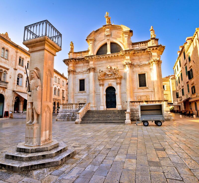 Dubrovnik square historic landmarks view, Orlando column and saint Blasius Church, Dalmatia region of Croatia