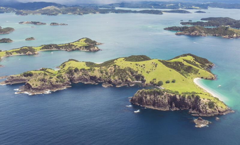 An aerial view over the Bay of Islands in New Zealand’s Northland Region.
