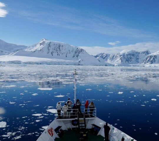 Breaking through the ice on an Antarctica cruise