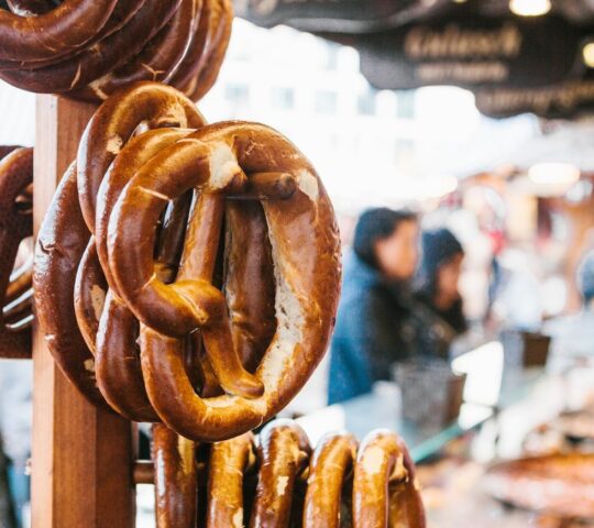 Pretzels hang on a street stall in Munich