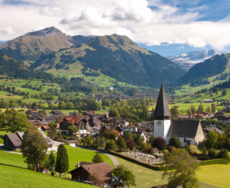 landscape near Gstaad, summer view to Saanen Church and village