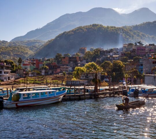 A fisherman prepares for the day along the shore of Lake Atitlan