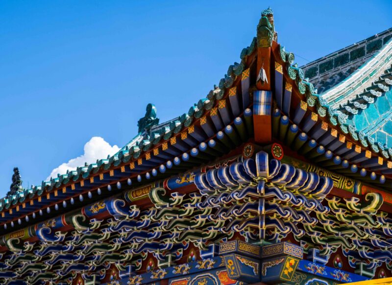 Multicolored tiled roof of ancient mongolian buddhist temple