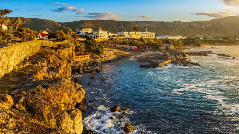 Early morning coastal view from Gearing’s Point of the rocky Hermanus coastline and Old Harbour, with the Kleinrivier Mountains in the background. Whale Coast, Overberg, Western Cape, South Africa. african, atlantic, attraction, cliff, coast, coastal, coastline, destination, early, gearing’s, harbor, harbour, hermanus, holiday, kleinrivier, landscape, marine, morning, mountain, mountains, nature, ocean, old, overberg, photo, photograph, point, region, rock, rocky, scenic, sea, seascape, seashore, seaside, shore, shoreline, south africa, stock, tourism, tourist, town, travel, vacation, view, viewpoint, water, waterfront, western cape, whale coast Hermanus view, Whale Coast From Adobe Stock