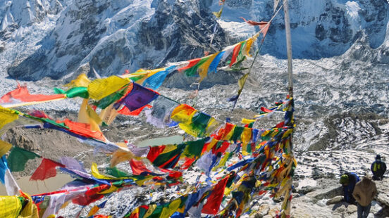 View of Mount Everest and Nuptse with buddhist prayer flags