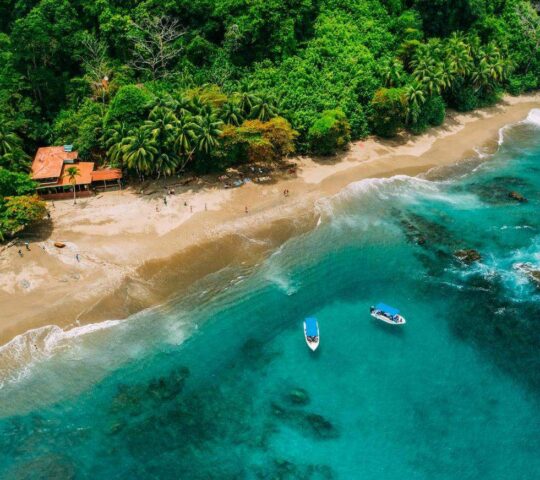 Boats moored in the turquoise waters of the Guanacaste Coast