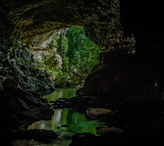 Explore the cave rivers of the Cayo District