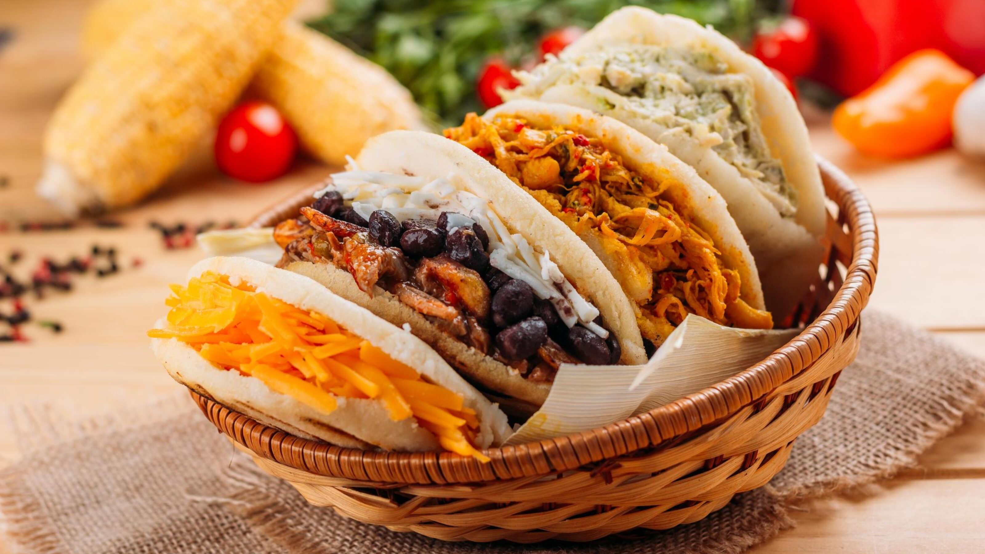 Combination of the typical South American Arepas in a woven basket