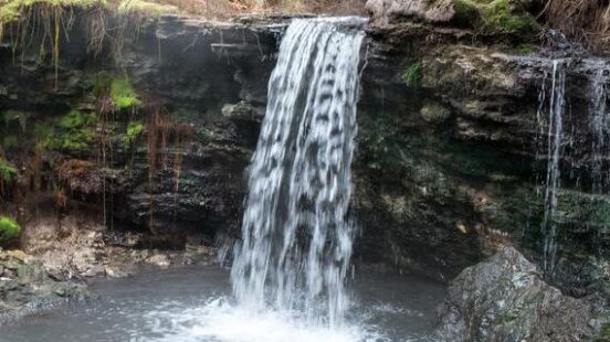 Waterfall on the Kerosene creek thermal river, rotorua, new zealand