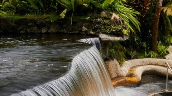 Tabacon geothermal waterfall in La Fortuna Arenal volcano area, Costa Rica