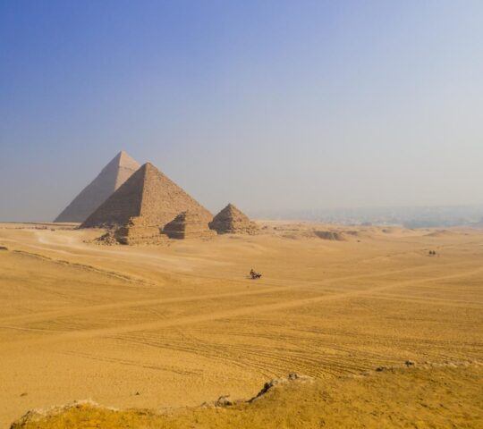 The enormous sahara and the mighty pyramids of Giza
