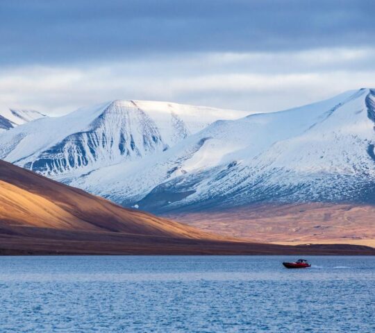 A zodiac boat on the waters of the Svalbard Islands