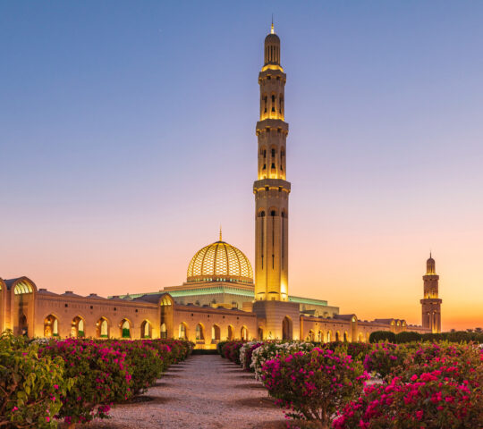 Watch the sunset over Sultan Qaboos Grand Mosque