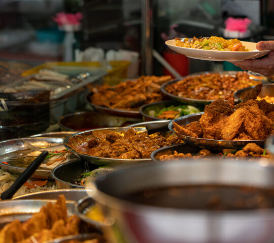 Sample delicious food at a hawker centre