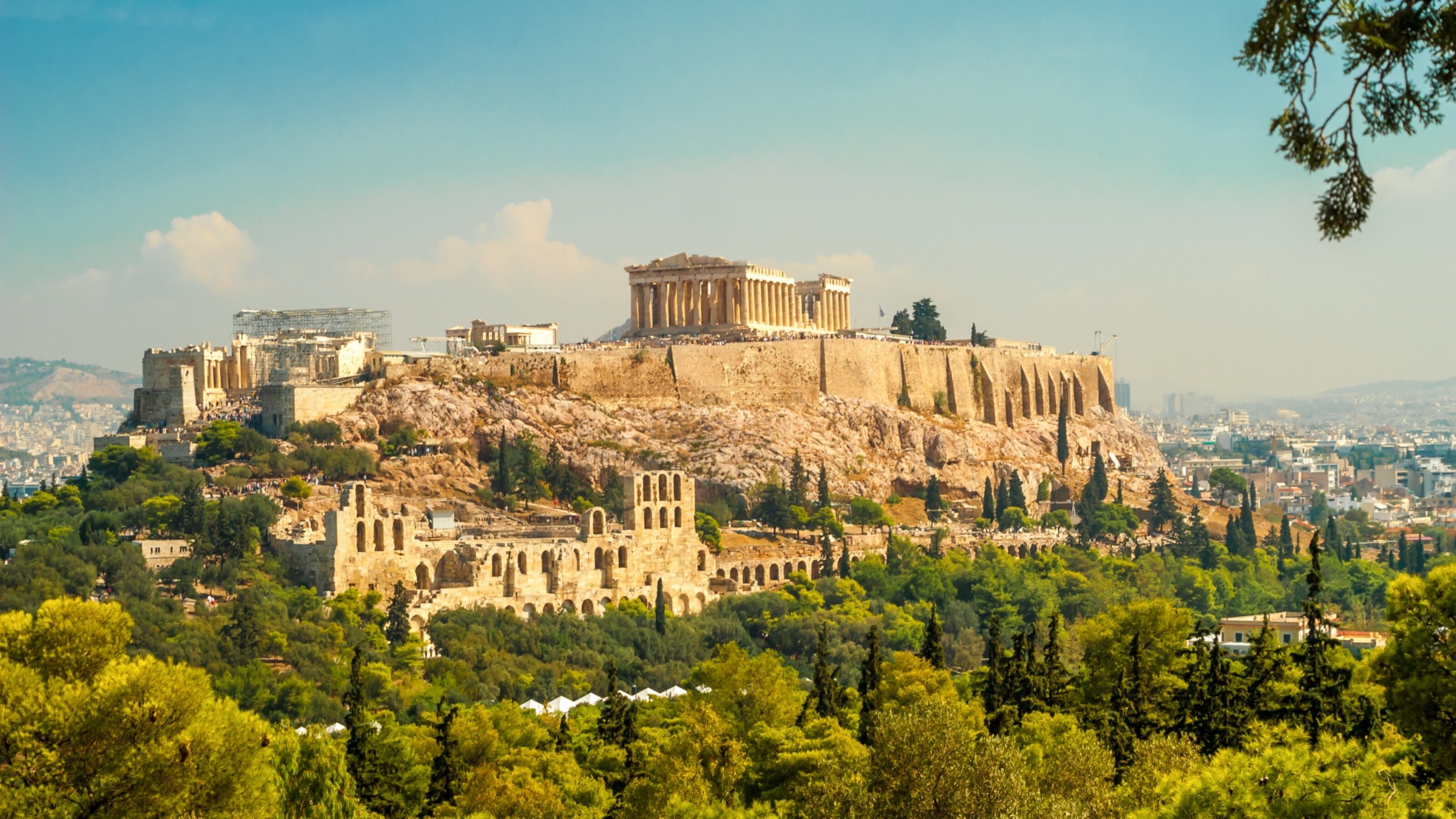 The Acropolis of Athens overlooking the city, with clear skies.