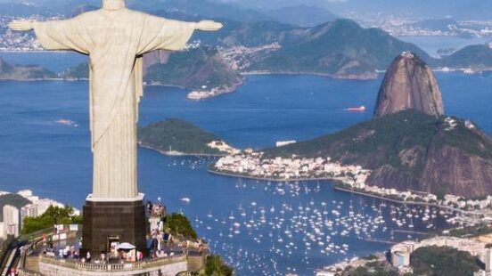 Aerial view of Rio de Janeiro cityscape with Christ the Redeemer, Brazil.