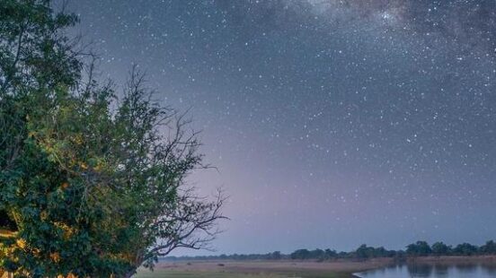 Stargazing outside by the river at Chinzombo Lodge