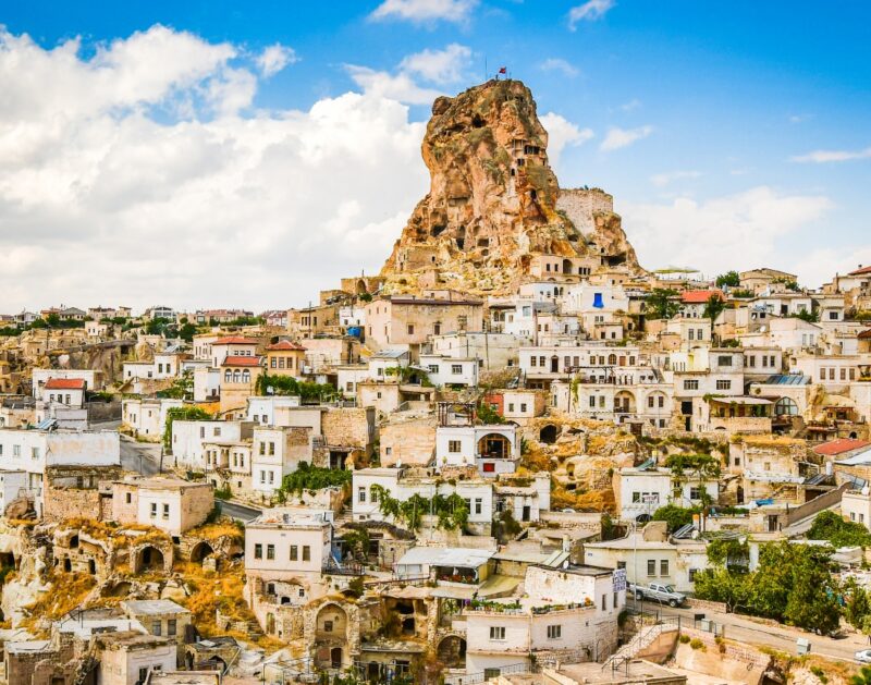 Ortahisar fortress with town panorama in Cappadocia, popular tourist destination
