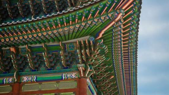 close up of the colorful patterned roof of gyeongbokgung palace