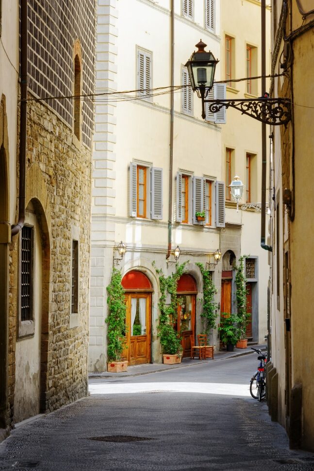 Scenic view of the Via Lambertesca street at historic center of Florence, Tuscany, Italy. Florence is a popular tourist destination of Europe.